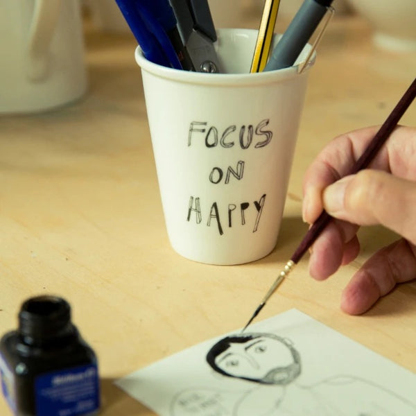 Focus on happy cup