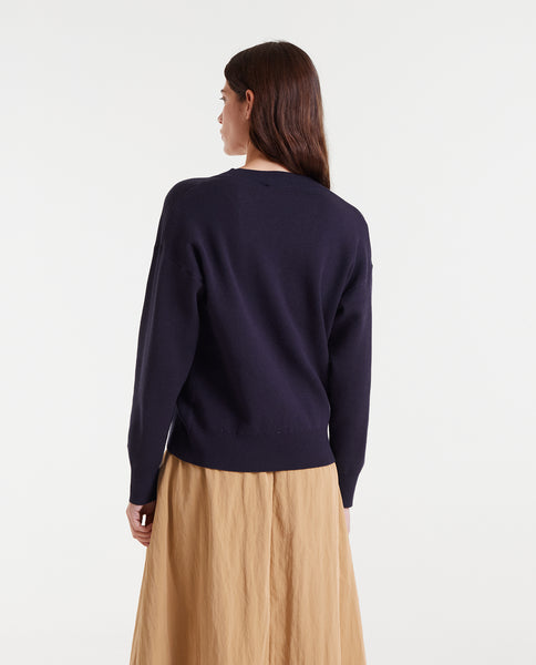 Jacquard knit sweater with big navy blue flower print