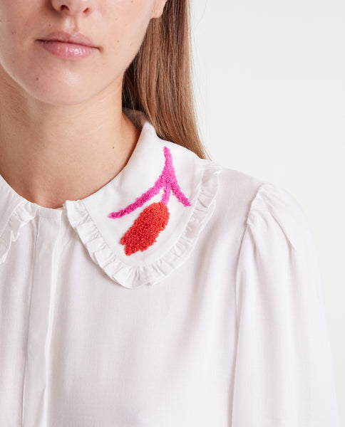 White shirt with tulip embroidery