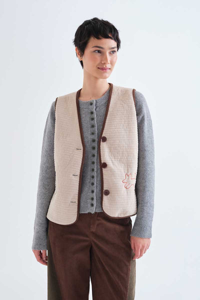 Off-white corduroy vest