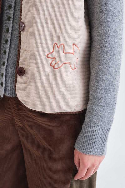 Off-white corduroy vest
