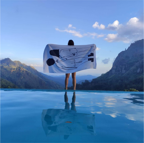 Beach towel naked couple back